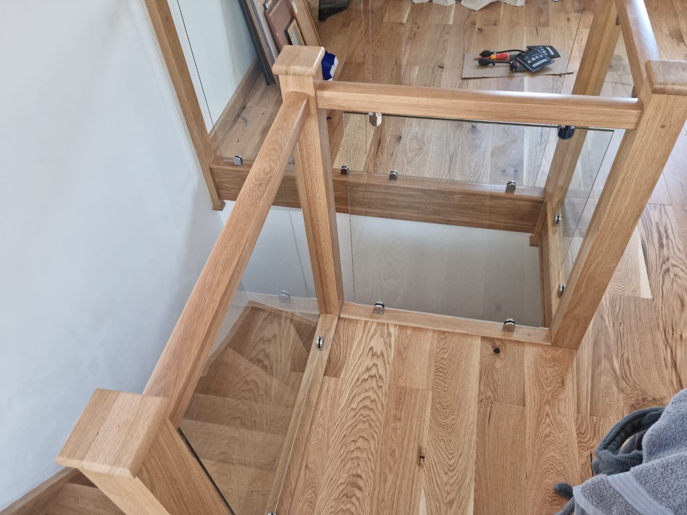 Timber stair balustrade with glass panels
