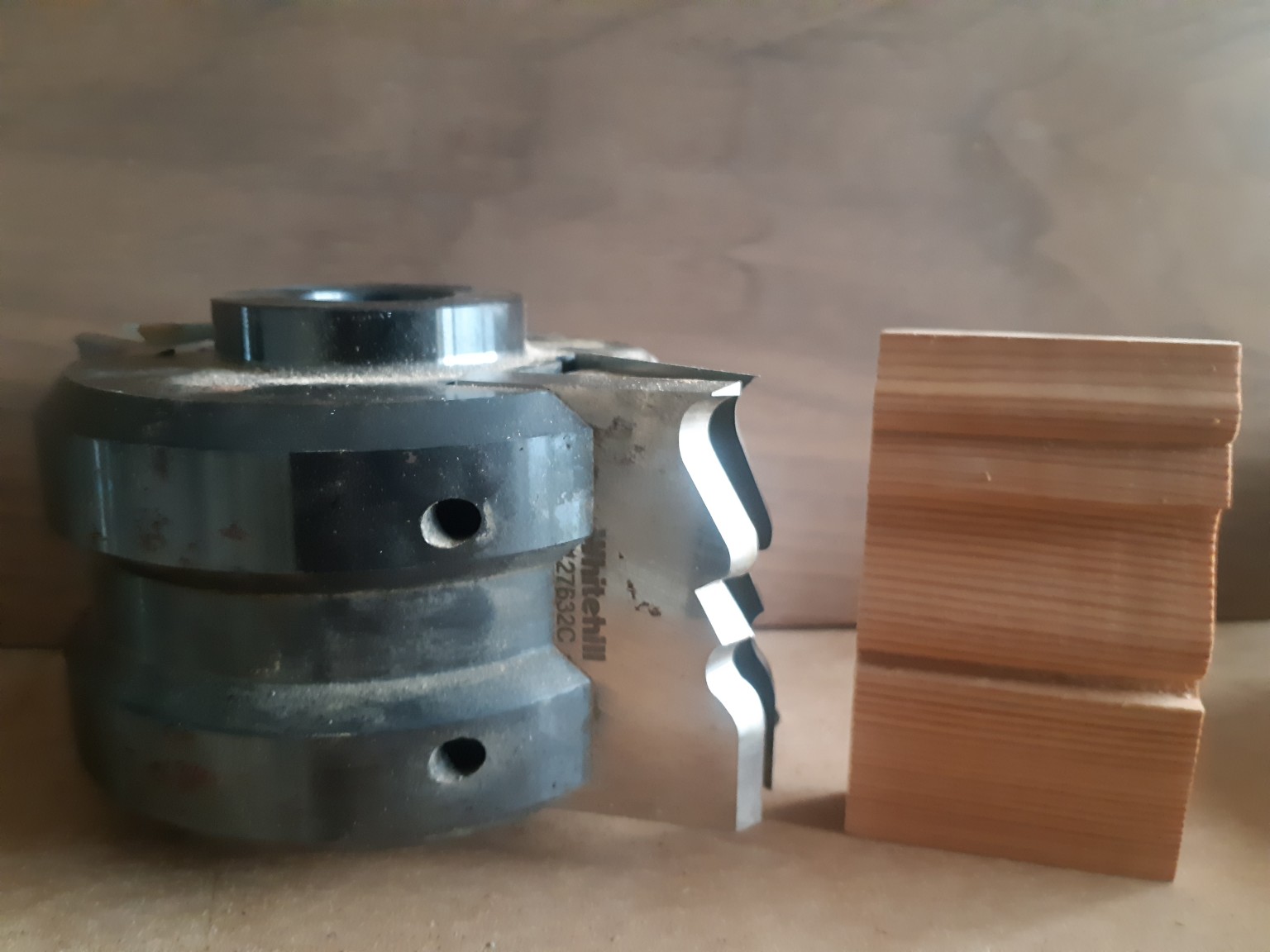 Moulding cutter beside a shaped timber sample in the Made To Measure workshop